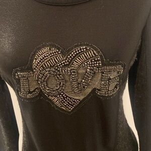 Vintage SIMON CHANG black long sleeved Top LOVE Front Embellishment Size Small.